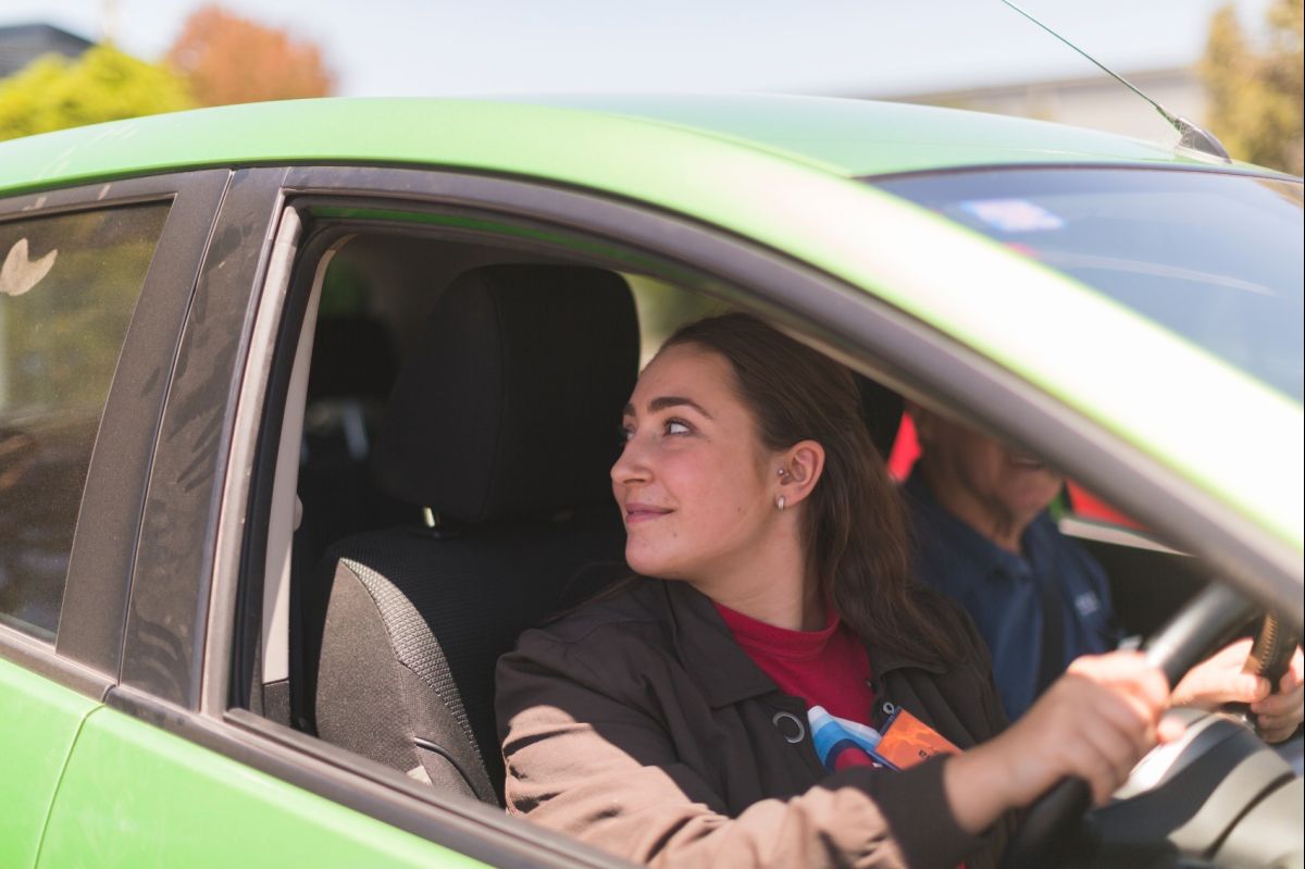 Green Mazda Student 3